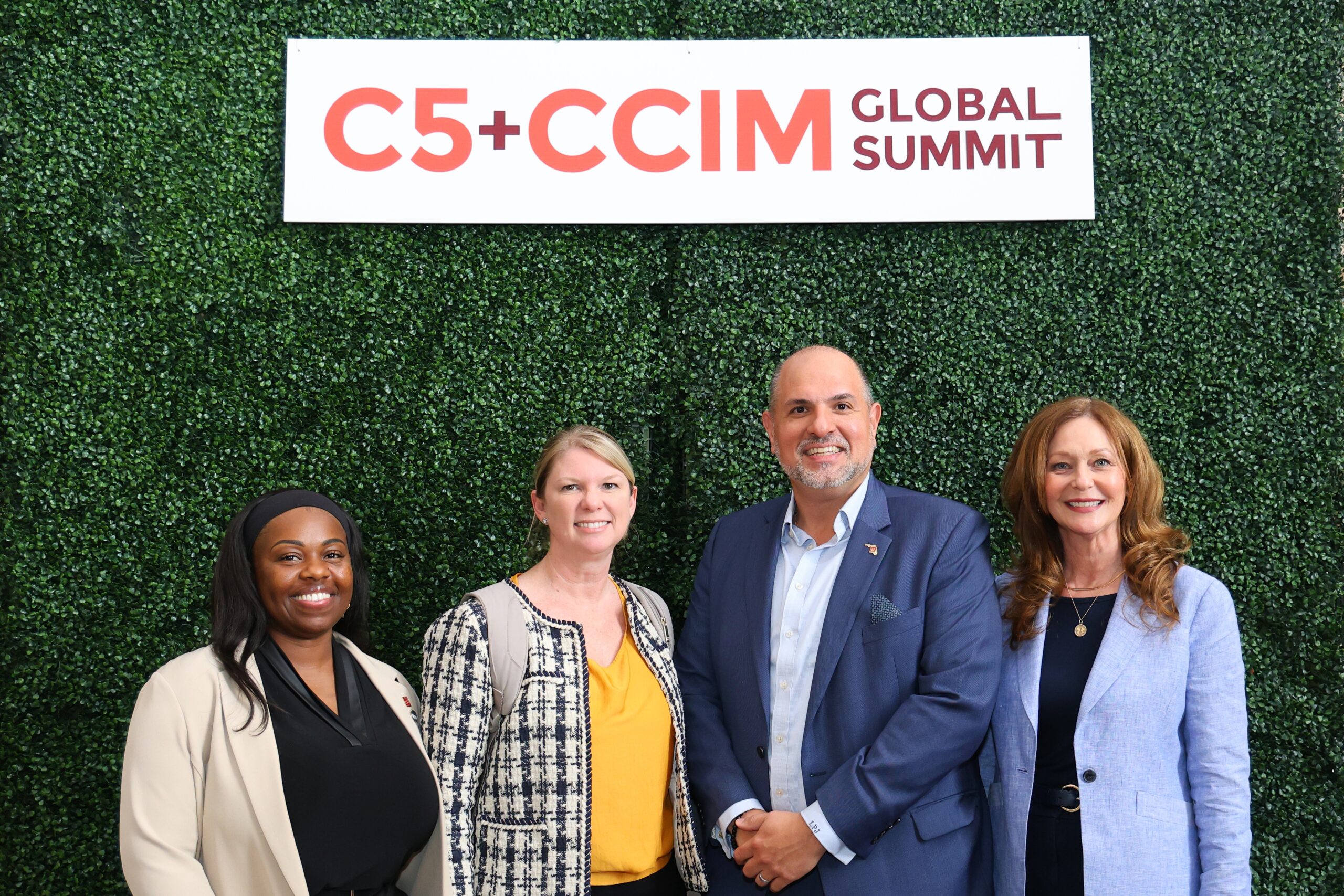 Attendees posing at the 2023 C5 + CCIM Global Summit